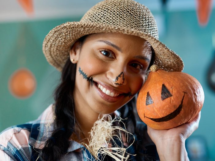 Image of Halloween Par-Tee at PGA Frisco with families dressed in costumes and enjoying golf activities.